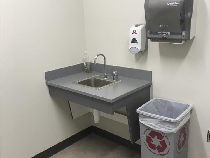 counter with sink and paper towels